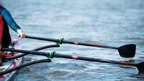 Double sculling on inflatable rowing board