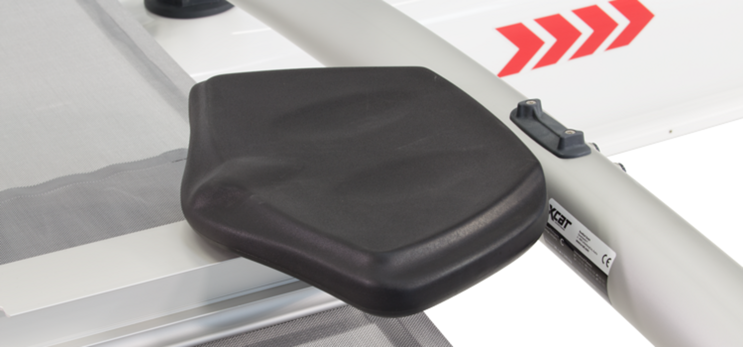 Sliding seat for catamaran rowing